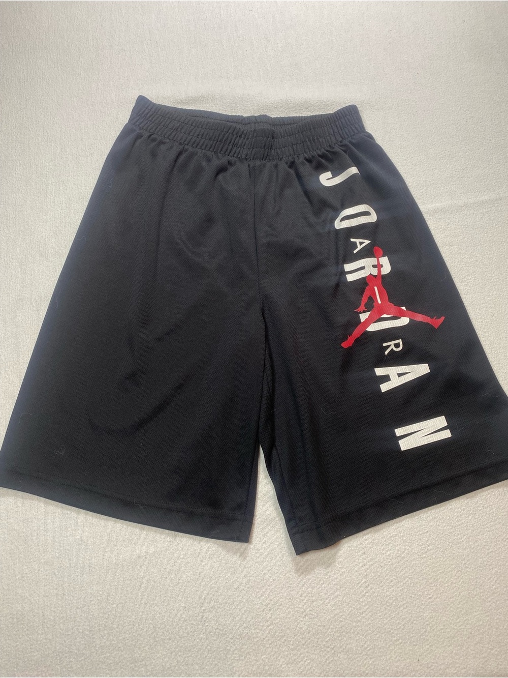 Jordan Boy’s Black Athletic Shorts with Red Jumpman Logo
